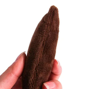 Interactive catnip cat toy in hand, brown chew and bite toy designed for playful cats.